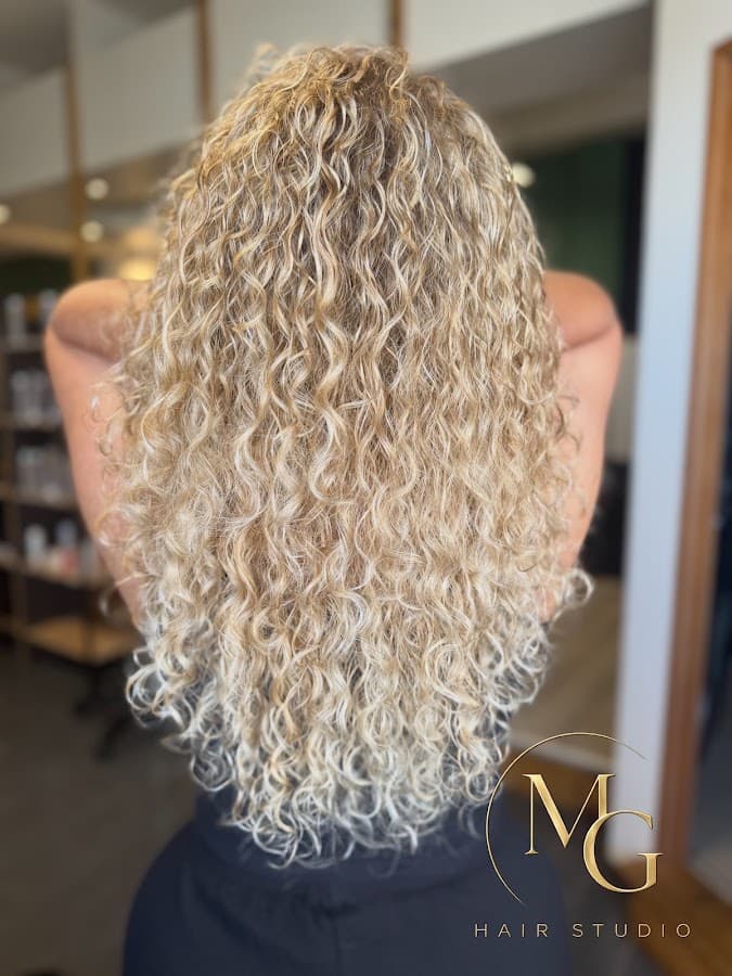 Photo de MG coiffure (Runboucles)